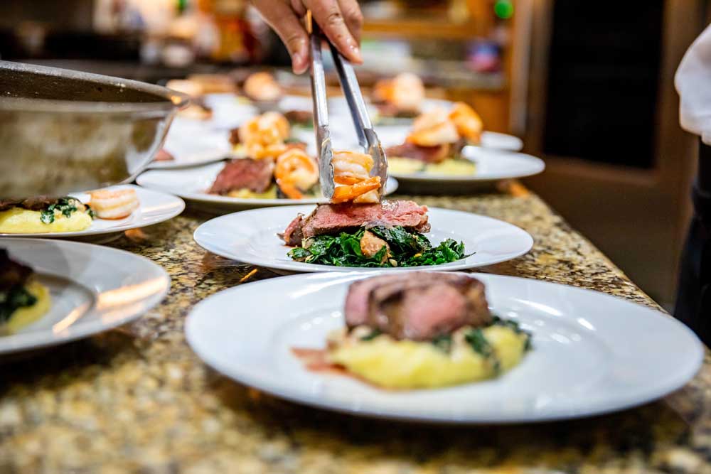 Shrimp being plated at the lodge